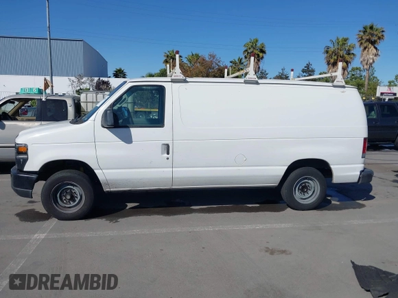 2013 Ford Econoline Cargo Commercial with VIN 1FTNE1EW7DDA98789, listed as a IAAI auction lot 42382594 with 251,602 mi miles and . Bid and sale history available at DreamBid. Image 14.