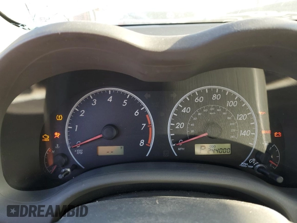 2010 Toyota Corolla with VIN 2T1BU4EE1AC363990, listed as a Copart auction lot 52001595 with 244,000 mi miles and Salvage title. Bid and sale history available at DreamBid. Image 9.
