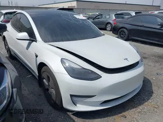2023 Tesla Model 3 with VIN 5YJ3E1EA7PF587797, listed as a IAAI auction lot 42293954 with 22,342 mi miles and . Bid and sale history available at DreamBid. Image 1.