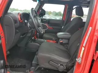 2015 Jeep Wrangler Unlimited Sport with VIN 1C4BJWDG6FL568082, listed as a Copart auction lot 58242945 with 114,637 mi miles and Salvage title. Bid and sale history available at DreamBid. Image 7.