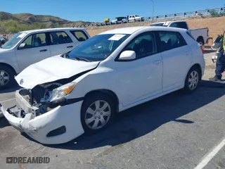 2009 Toyota Matrix with VIN 2T1KU40E99C113853, listed as a IAAI auction lot 41872067 with 179,114 mi miles. Bid and sale history available at carsss.com. Image 2.