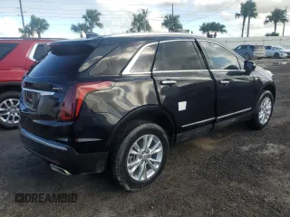 2022 Cadillac XT5 FWD Luxury z VIN 1GYKNAR4XNZ165234, wystawiony jako Copart lot #46728785 z przebiegiem 36 100 mil mil oraz Nie do naprawy • Non repairable. Historia ofert i sprzedaży dostępna na DreamBid. Obrazek 3.