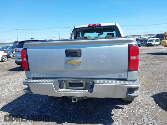 2018 Chevrolet Silverado 1500 LT with VIN 1GCVKREC8JZ237565, listed as a IAAI auction lot 42052619 with 92,790 mi miles and . Bid and sale history available at DreamBid. Image 16.