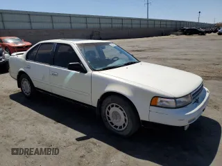 1990 Nissan Maxima z VIN JN1HJ01PXLT390008, wystawiony jako Copart lot #53529815 z przebiegiem 163 186 mil mil oraz Tytuł czysty. Historia ofert i sprzedaży dostępna na DreamBid. Obrazek 4.