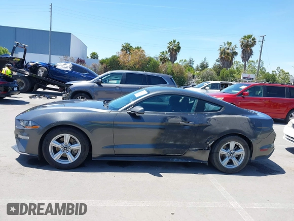 2018 Ford Mustang EcoBoost с VIN 1FA6P8TH1J5145175, выставлен на аукционе IAAI как лот 42268107 с пробегом 97 211 миль миль и . История ставок и продаж доступна на DreamBid. Изображение 14.