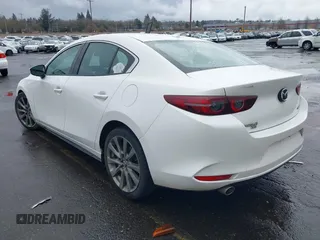 2020 Mazda 3 Premium with VIN 3MZBPBEMXLM133357, listed as a IAAI auction lot 41540234 with 81,280 mi miles and . Bid and sale history available at DreamBid. Image 3.