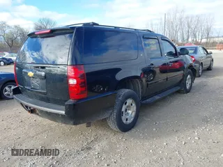 2014 Chevrolet Suburban LT with VIN 1GNSKJE71ER232700, listed as a IAAI auction lot 40812602 with 245,852 mi miles and . Bid and sale history available at DreamBid. Image 4.