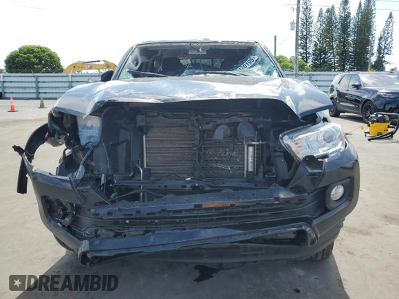2023 Toyota Tacoma SR z VIN 3TYCZ5ANXPT136237, wystawiony jako Copart lot #62584345 z przebiegiem 32 674 mil mil oraz Szkoda całkowita • Salvage title. Historia ofert i sprzedaży dostępna na DreamBid. Obrazek 5.