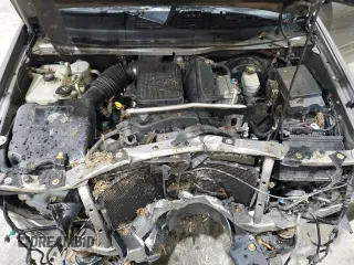 2005 GMC Envoy SLE с VIN 1GKDS13S752274178, выставлен на аукционе Copart как лот 55289005 с пробегом 199 378 миль миль и Списание • Salvage title. История ставок и продаж доступна на DreamBid. Изображение 12.