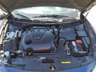 2019 Nissan Maxima Platinum z VIN 1N4AA6AV0KC373397, wystawiony jako Copart lot #52487625 z przebiegiem 50 894 mil mil oraz Szkody całkowita. Historia ofert i sprzedaży dostępna na DreamBid. Obrazek 11.
