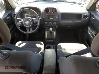 2015 Jeep Patriot Latitude with VIN 1C4NJPFB3FD377959, listed as a Copart auction lot 57914755 with 106,704 mi miles and Salvage title. Bid and sale history available at DreamBid. Image 8.