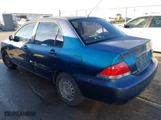 2005 Mitsubishi Lancer ES with VIN JA3AJ26E65U014838, listed as a IAAI auction lot 41310586 with 127,487 mi miles. Bid and sale history available at carsss.com. Image 3.