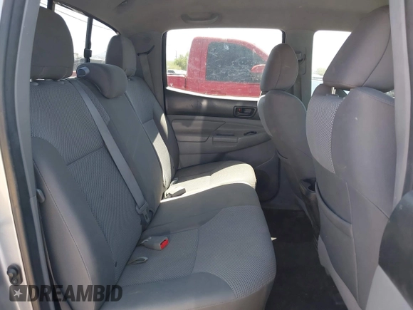 2015 Toyota Tacoma with VIN 3TMLU4EN6FM188736, listed as a IAAI auction lot 42605859 with 210,717 mi miles and . Bid and sale history available at DreamBid. Image 8.