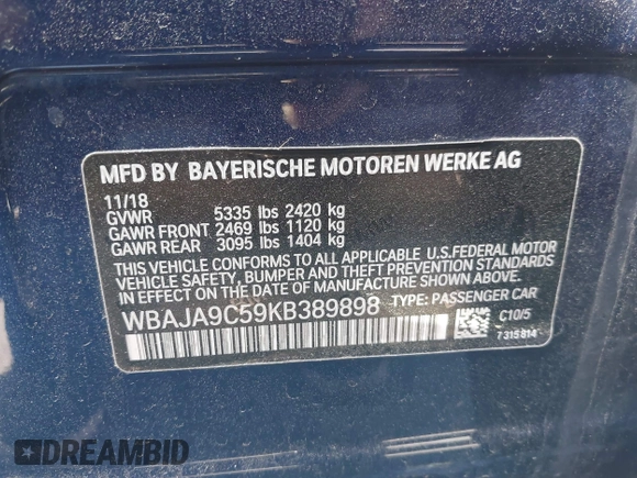 2019 BMW 5 Series 530e iPerformance with VIN WBAJA9C59KB389898, listed as a IAAI auction lot 41479595 with 90,965 mi miles. Bid and sale history available at carsss.com. Image 9.