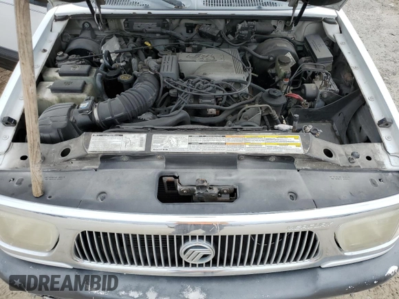 2000 Mercury Mountaineer with VIN 4M2ZU66P5YUJ09197, listed as a Copart auction lot 75933804 with 202,600 mi miles and Non repairable. Bid and sale history available at DreamBid. Image 12.