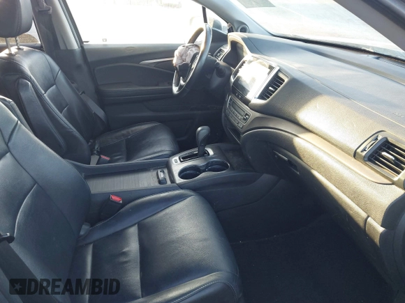 2017 Honda Pilot EX-L with VIN 5FNYF5H74HB010026, listed as a IAAI auction lot 41633770 with 170,383 mi miles and . Bid and sale history available at DreamBid. Image 5.