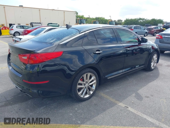 2014 Kia Optima SXL Turbo with VIN 5XXGR4A69EG348934, listed as a IAAI auction lot 42322630 with 119,171 mi miles and . Bid and sale history available at DreamBid. Image 4.