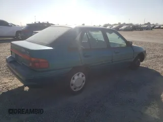 1995 Ford Escort z VIN 1FASP14J9SW304866, wystawiony jako Copart lot #73006174 z przebiegiem 126 068 mil mil oraz Szkoda całkowita • Salvage title. Historia ofert i sprzedaży dostępna na DreamBid. Obrazek 3.