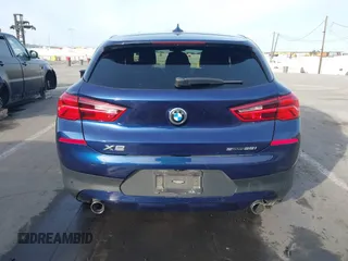 2020 BMW X2 sDrive28i with VIN WBXYH9C02L5P01502, listed as a IAAI auction lot 41397416 with 82,660 mi miles. Bid and sale history available at carsss.com. Image 16.