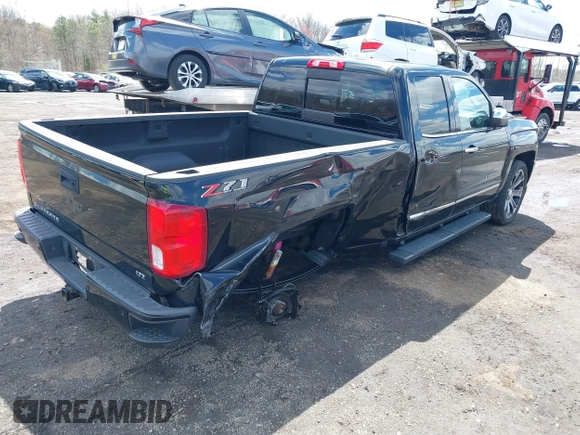 2018 Chevrolet Silverado 1500 with VIN 1GCVKSEC3JZ125571, listed as a IAAI auction lot 41982881 with 58,410 mi miles and . Bid and sale history available at DreamBid. Image 4.