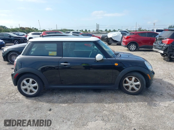 2010 MINI Hardtop with VIN WMWMF3C5XATU77265, listed as a IAAI auction lot 42007797 with 28,856 mi miles and . Bid and sale history available at DreamBid. Image 13.