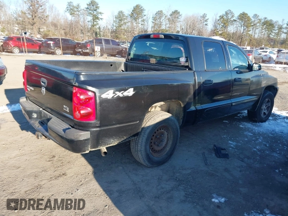 2006 Dodge Dakota SLT z VIN 1D7HW48N96S671842, wystawiony jako IAAI lot #41286872 z przebiegiem 192 914 mil mil oraz . Historia ofert i sprzedaży dostępna na DreamBid. Obrazek 4.