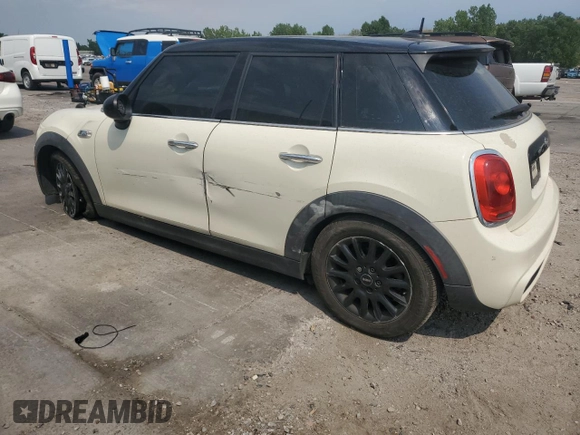 2016 MINI Hardtop 4 Door S with VIN WMWXU3C57G2B63075, listed as a Copart auction lot 63998995 with 71,008 mi miles and Salvage title. Bid and sale history available at DreamBid. Image 2.