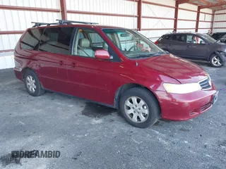 2004 Honda Odyssey EX-L with VIN 5FNRL18994B048661, listed as a IAAI auction lot 41758209 with 295,737 mi miles and . Bid and sale history available at DreamBid. Image 1.