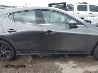 2021 Mazda 3 Premium z VIN JM1BPAML1M1318708, wystawiony jako IAAI lot #42178243 z przebiegiem 62 455 mil mil oraz . Historia ofert i sprzedaży dostępna na DreamBid. Obrazek 13.