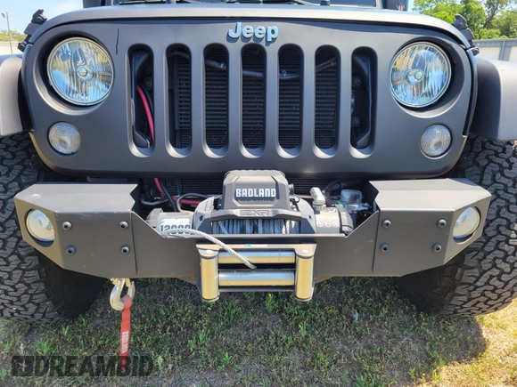 2014 Jeep Wrangler Unlimited Sport with VIN 1C4HJWDG4EL159619, listed as a IAAI auction lot 42176313 with 79,715 mi miles and . Bid and sale history available at DreamBid. Image 6.