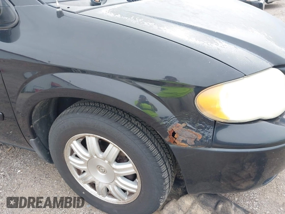 2005 Chrysler Town & Country Touring with VIN 2C4GP54L45R277761, listed as a IAAI auction lot 42144191 with 140,864 mi miles and . Bid and sale history available at DreamBid. Image 6.