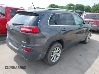 2015 Jeep Cherokee Latitude z VIN 1C4PJMCS2FW601271, wystawiony jako IAAI lot #41969742 z przebiegiem 94 224 mil mil oraz . Historia ofert i sprzedaży dostępna na DreamBid. Obrazek 4.