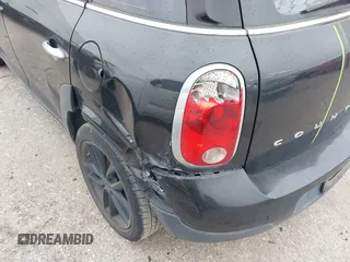 2015 MINI Countryman with VIN WMWZB3C53FWR43819, listed as a IAAI auction lot 41610007 with 134,185 mi miles and . Bid and sale history available at DreamBid. Image 6.