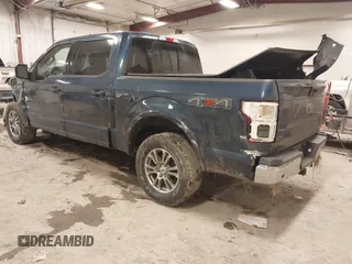 2018 Ford F-150 XL with VIN 1FTEW1EP4JFA00923, listed as a IAAI auction lot 41506293 with 153,523 mi miles and . Bid and sale history available at DreamBid. Image 3.