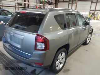 2014 Jeep Compass Sport with VIN 1C4NJDBB5ED567863, listed as a IAAI auction lot 41704644 with 163,405 mi miles. Bid and sale history available at carsss.com. Image 4.