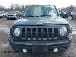 2014 Jeep Patriot Latitude with VIN 1C4NJRFB9ED778409, listed as a IAAI auction lot 41952027 with 88,306 mi miles and . Bid and sale history available at DreamBid. Image 12.