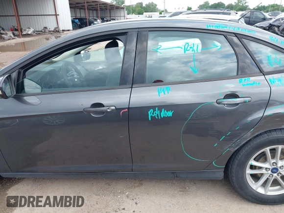 2017 Ford Focus SE with VIN 1FADP3F23HL232809, listed as a IAAI auction lot 42117700 with 104,802 mi miles and . Bid and sale history available at DreamBid. Image 14.