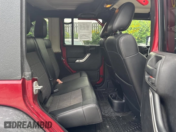 2012 Jeep Wrangler Unlimited Sport with VIN 1C4BJWDG5CL289329, listed as a Copart auction lot 65816775 with 152,632 mi miles and Clean title. Bid and sale history available at DreamBid. Image 6.