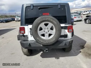2013 Jeep Wrangler Unlimited Sport with VIN 1C4BJWDG7DL634412, listed as a Copart auction lot 50648545 with 77,014 mi miles and Salvage Title. Bid and sale history available at carsss.com. Image 6.