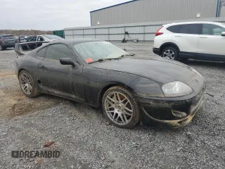 1997 Toyota Supra с VIN JT2DE82A0V0037380, выставлен на аукционе Copart как лот 74052604 с пробегом Не указан миль и Списание • Salvage title. История ставок и продаж доступна на DreamBid. Изображение 4.