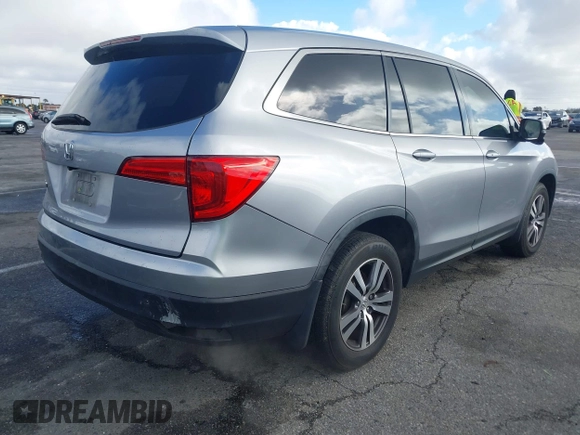 2016 Honda Pilot EX-L with VIN 5FNYF5H57GB038349, listed as a IAAI auction lot 41378569 with 117,651 mi miles and . Bid and sale history available at DreamBid. Image 4.