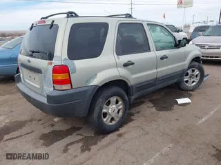 2003 Ford Escape XLT Popular 2 with VIN 1FMYU93183KB80977, listed as a IAAI auction lot 41657209 with 1 mi miles. Bid and sale history available at carsss.com. Image 4.