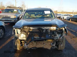 2021 Toyota Tacoma SR z VIN 3TMCZ5AN5MM386394, wystawiony jako IAAI lot #41821364 z przebiegiem 54 070 mil mil oraz . Historia ofert i sprzedaży dostępna na DreamBid. Obrazek 13.