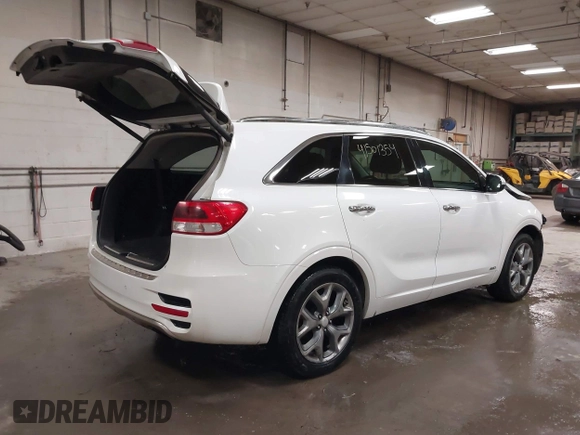 2016 Kia Sorento SX with VIN 5XYPKDA51GG077698, listed as a IAAI auction lot 41501354 with 185,494 mi miles. Bid and sale history available at carsss.com. Image 4.