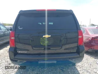 2018 Chevrolet Tahoe LT with VIN 1GNSKBKC7JR245565, listed as a IAAI auction lot 42097400 with 123,709 mi miles and . Bid and sale history available at DreamBid. Image 17.