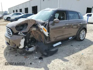 2015 MINI Countryman with VIN WMWZB3C55FWR46334, listed as a Copart auction lot 55421795 with 33,135 mi miles and Salvage Title. Bid and sale history available at DreamBid. Image 1.