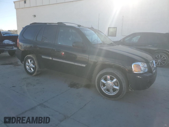 2005 GMC Envoy SLE with VIN 1GKDT13S452285975, listed as a Copart auction lot 46371785 with 358,411 mi miles and Salvage Title. Bid and sale history available at carsss.com. Image 4.