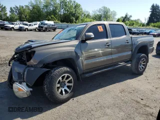 2014 Toyota Tacoma with VIN 5TFLU4EN3EX092801, listed as a Copart auction lot 58412295 with 169,408 mi miles and Salvage title. Bid and sale history available at DreamBid. Image 1.
