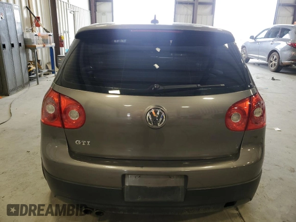 2009 Volkswagen GTI z VIN WVWGD71K99W131014, wystawiony jako Copart lot #47857095 z przebiegiem 180 763 mil mil oraz Szkoda całkowita • Salvage title. Historia ofert i sprzedaży dostępna na DreamBid. Obrazek 6.