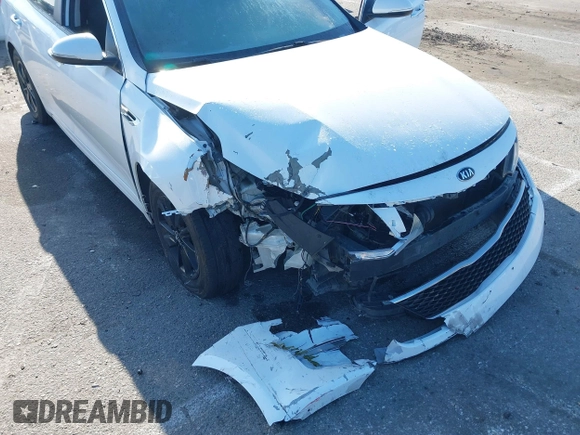 2016 Kia Optima LX with VIN 5XXGT4L33GG014082, listed as a IAAI auction lot 41870030 with 137,849 mi miles and . Bid and sale history available at DreamBid. Image 6.